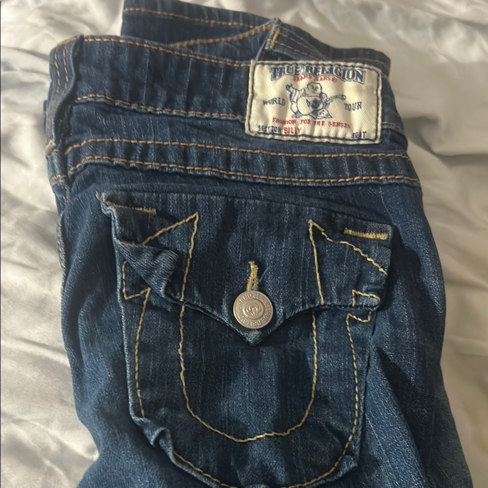True Religion Blue Jeans with Horseshoe Stitching and Distressed Finish